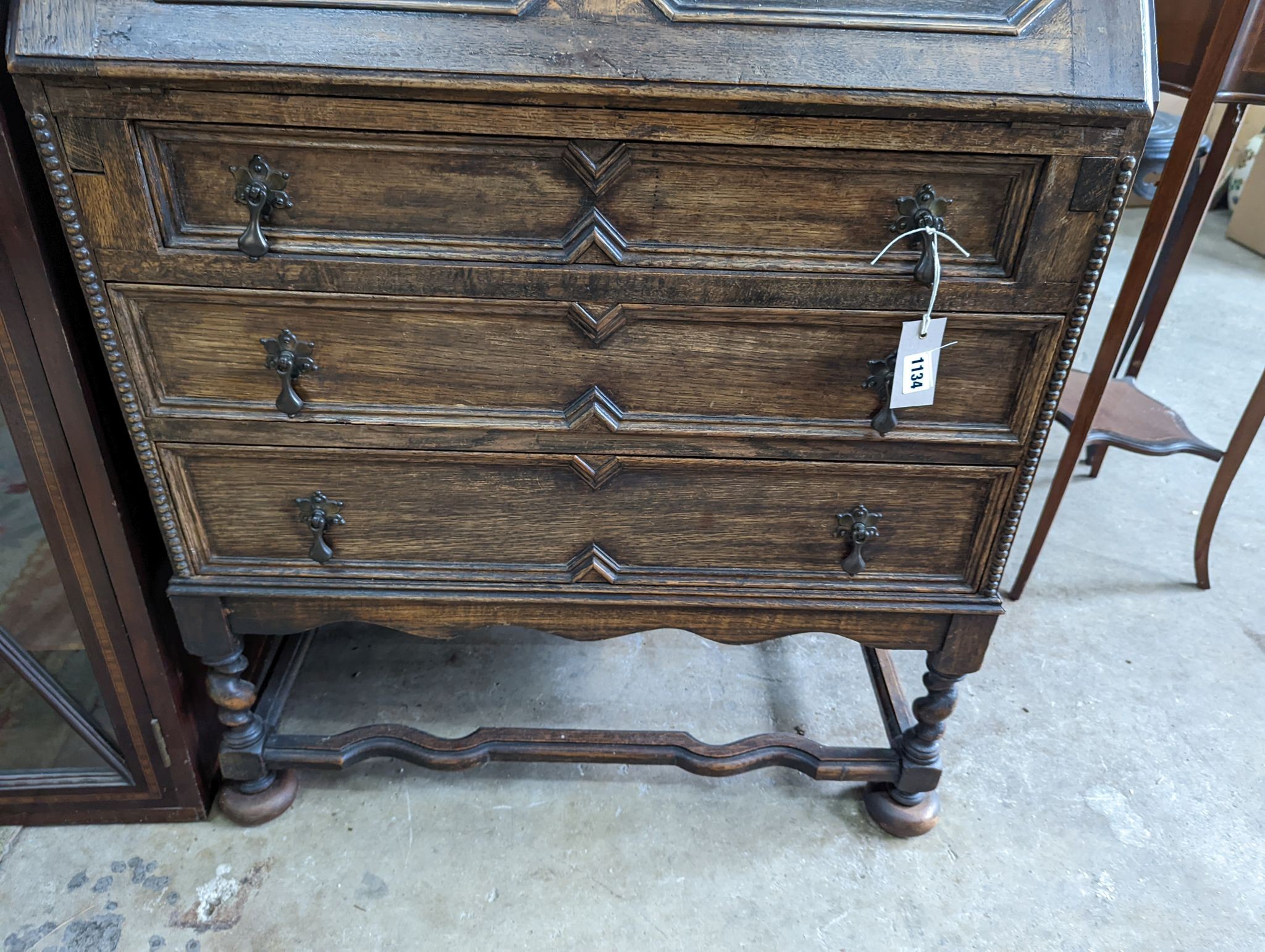 An early 20th century oak bureau, width 73cm, depth 41cm, height 99cm